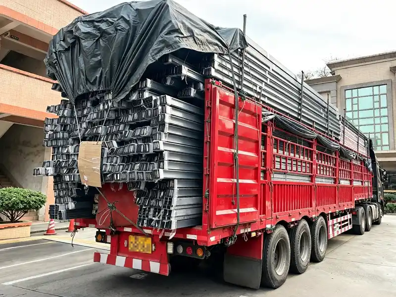 First shipment of aluminum profiles loaded onto a truck for international export in 2011.