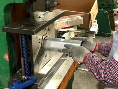 Worker operating manual punching machine