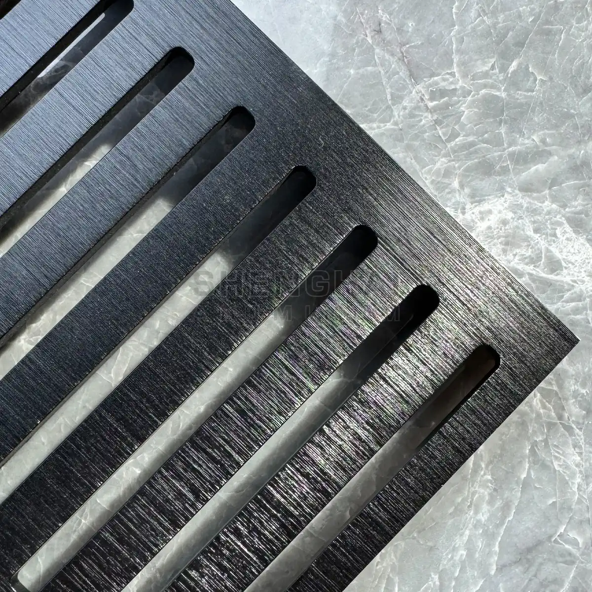 Precision punched aluminum grate