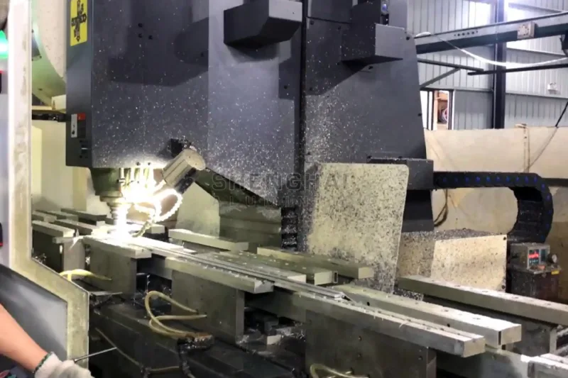 Industrial SH-ALUMINUM 3-axis CNC milling center processing 6-meter industrial aluminum profiles with 3600T extrusion stability.